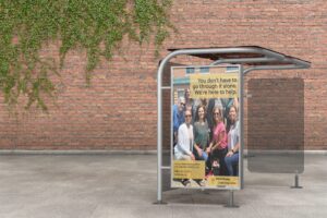 Bus stop sign that promotes Maria Droste Counseling Center
