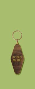 Wooden keychain that says Rotro Motel.