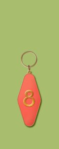 Red keychain that says 4.